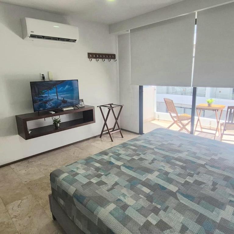 Relájate en la playa y la piscina con vista al mar - Apartamento de 1 dormitorio - 1