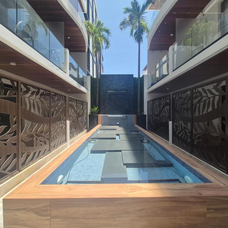 Relájate en la playa y la piscina con vista al mar - Apartamento de 1 dormitorio - 36