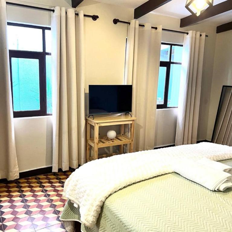 Casita Vintage with a Grill, Patio and Parking - Apartamento - 17