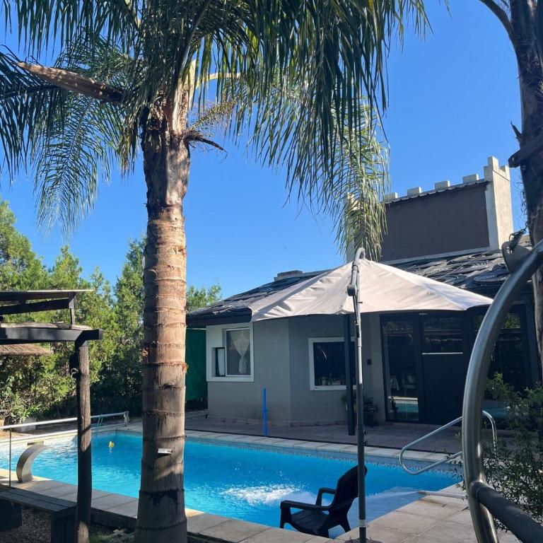 Moderna casa entera en Pueblo Gral Belgrano - Casa con 1 dormitorio - 36