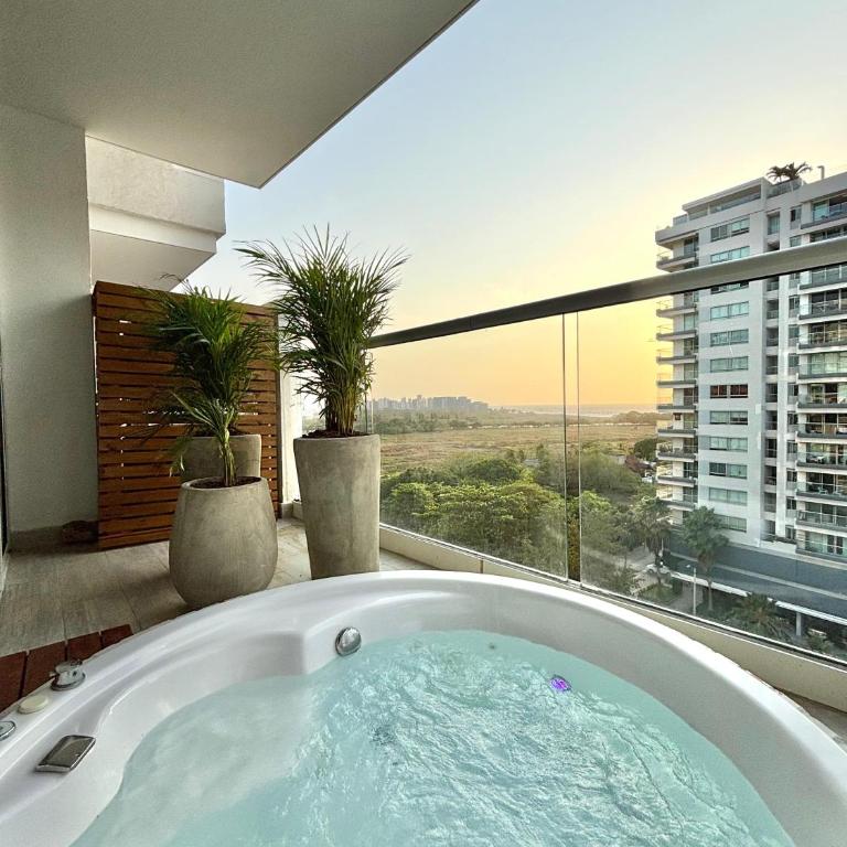Caribbean Luxury 2BR 2Bth Gem with sea views, hot water and private jacuzzi on balcony - One-Bedroom Apartment - 6