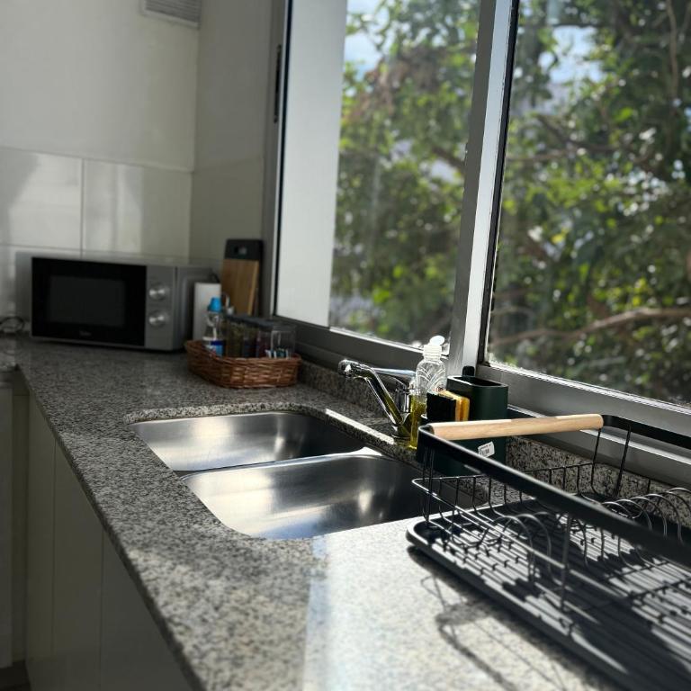 Depto en Gral Paz Pileta quincho y asador - One-Bedroom Apartment - 14