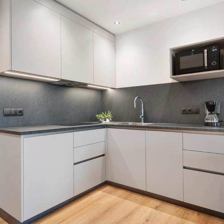Sankt Corbinian Apartement 2 - Appartamento Deluxe con 2 Camere da Letto e Vista Giardino - 10