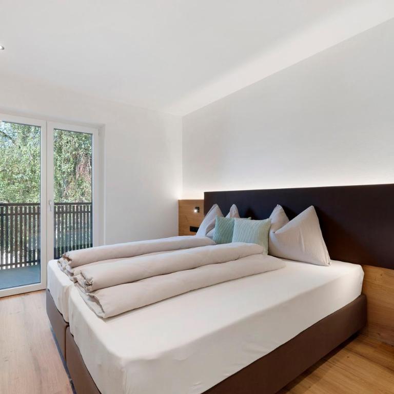 Sankt Corbinian Apartement 2 - Appartamento Deluxe con 2 Camere da Letto e Vista Giardino - 11