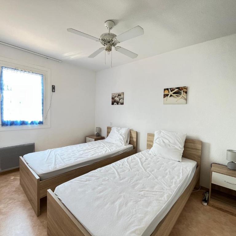 Belle villa 2 chambres, veranda, terrasse parking privatif dans résidence sécurisée avec piscine commune 800 m de la mer LRCS87 - Haus mit 2 Schlafzimmern - 9