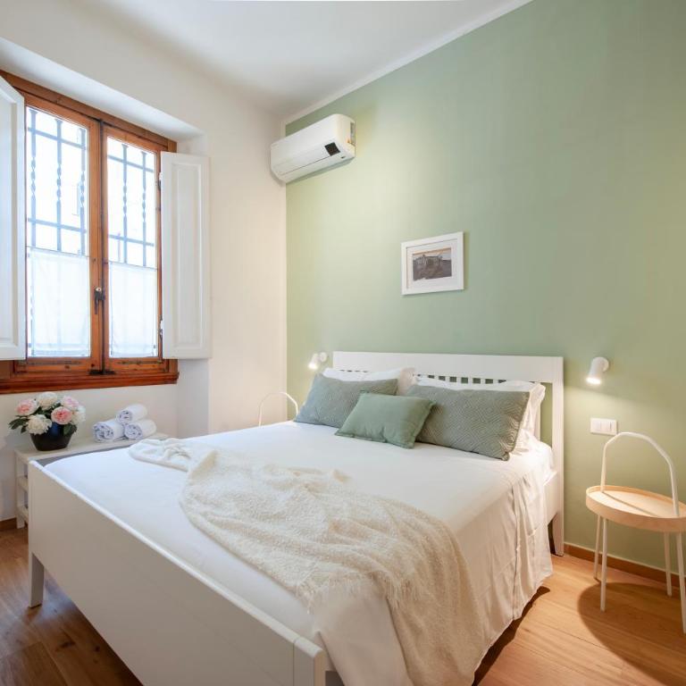 Luminoso Appartamento con Giardino e Terrazza Privati - 2 Camere - Parcheggio Comodo - Two-Bedroom Apartment with Garden View - 2