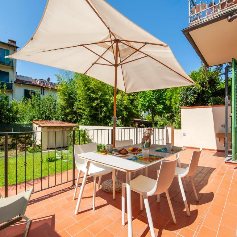 Luminoso Appartamento con Giardino e Terrazza Privati - 2 Camere - Parcheggio Comodo - Two-Bedroom Apartment with Garden View - 4