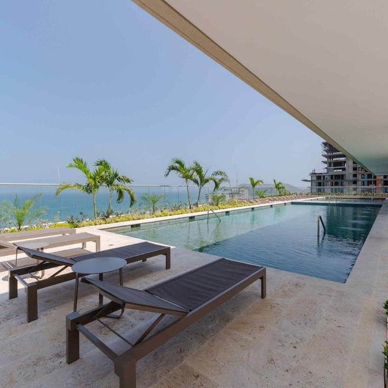 Amplio Apartamento con Vista Lateral al Mar - Three-Bedroom Apartment - 6