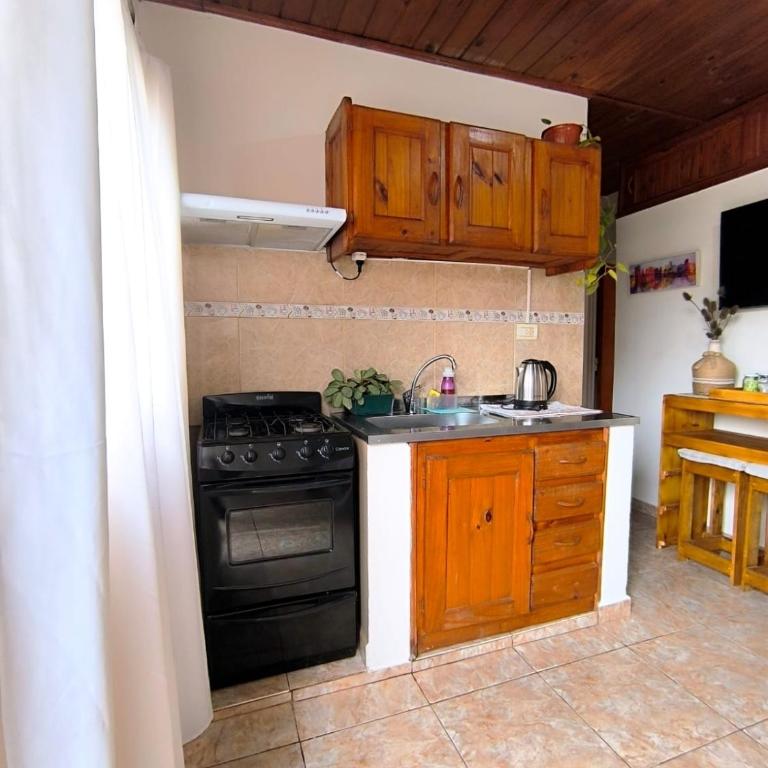 Refugio del Uruguay - Alquiler Temporario - Apartamento de 1 dormitorio con jardín - 4