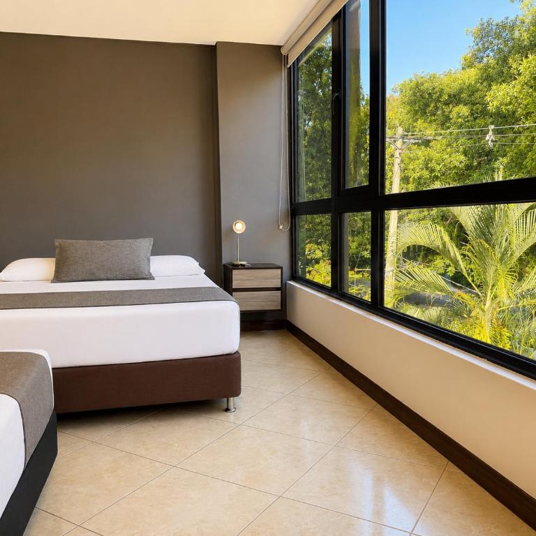 Hotel Laureles Palo Alto - Deluxe Triple Room - 5
