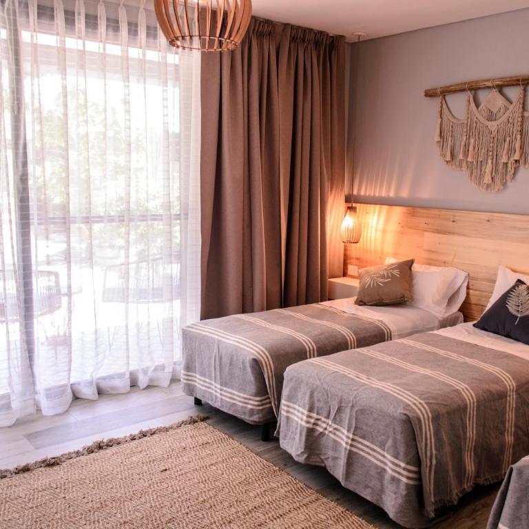 Refugio Padma - Deluxe Triple Room - 1