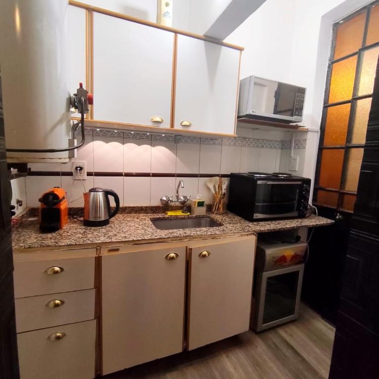 Peatonal y San Martín Galeria Historica Departamento - Three-Bedroom Apartment - 73