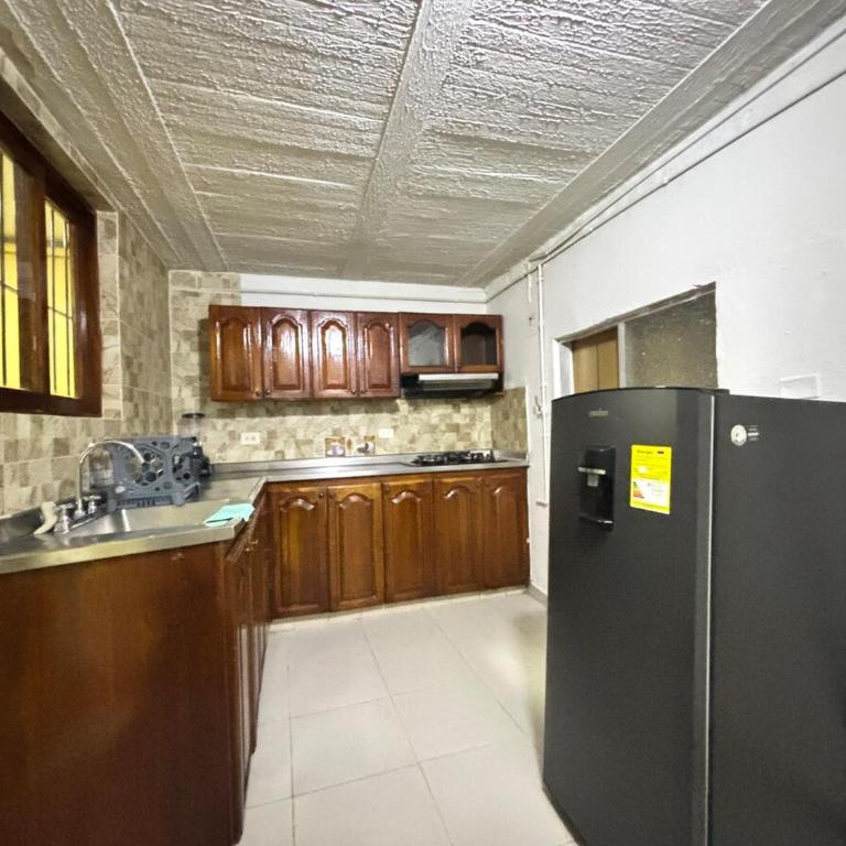 Tu sala exterior en el corazón de Bello - Two-Bedroom Apartment - 2