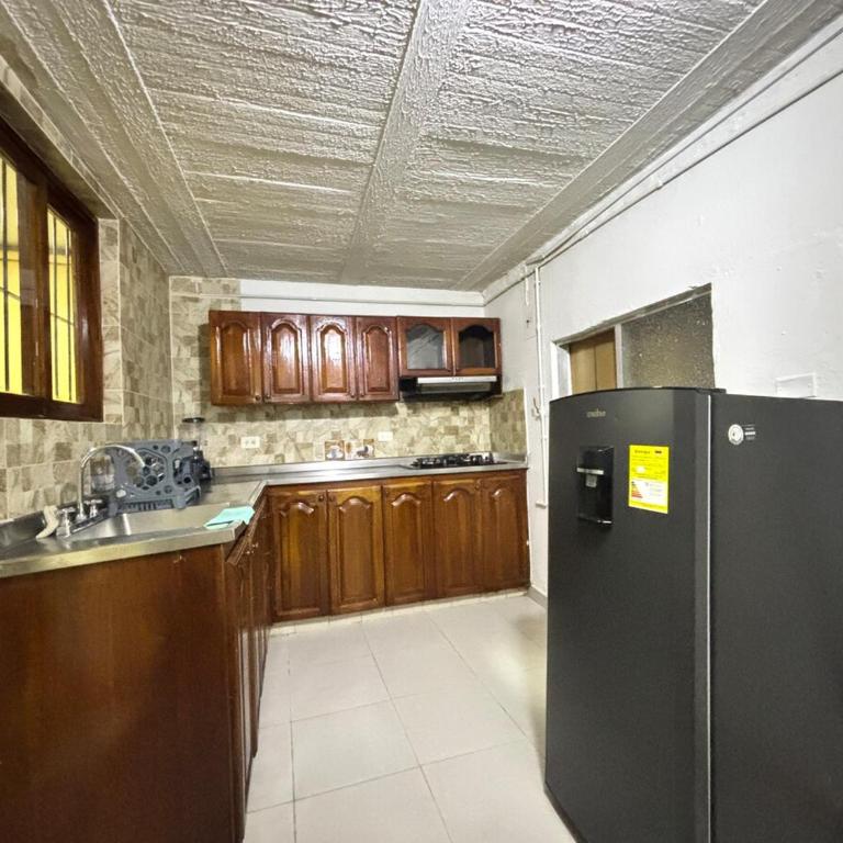 Tu sala exterior en el corazón de Bello - Two-Bedroom Apartment - 10