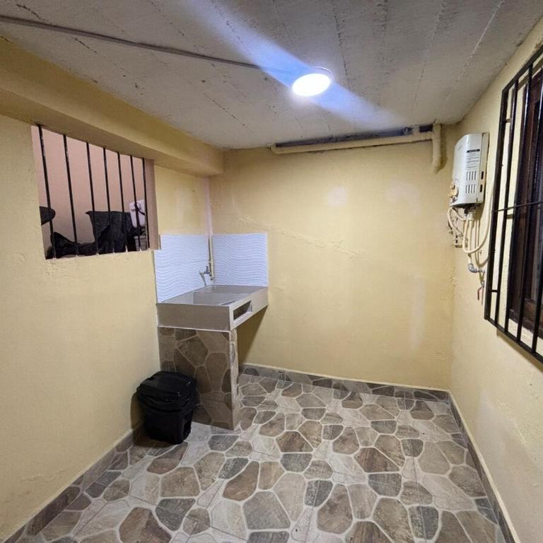 Tu sala exterior en el corazón de Bello - Two-Bedroom Apartment - 12