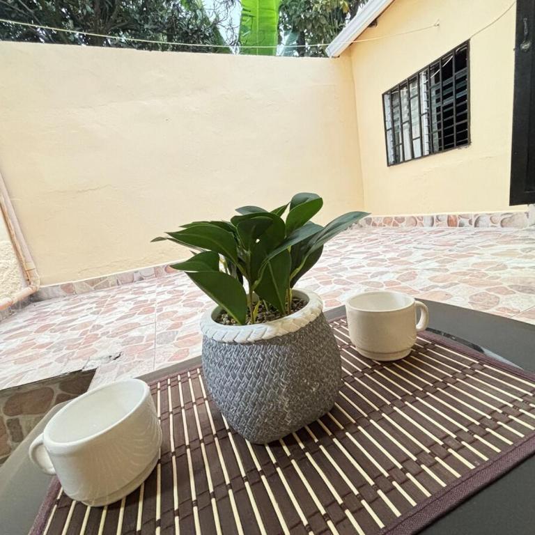 Tu sala exterior en el corazón de Bello - Two-Bedroom Apartment - 14