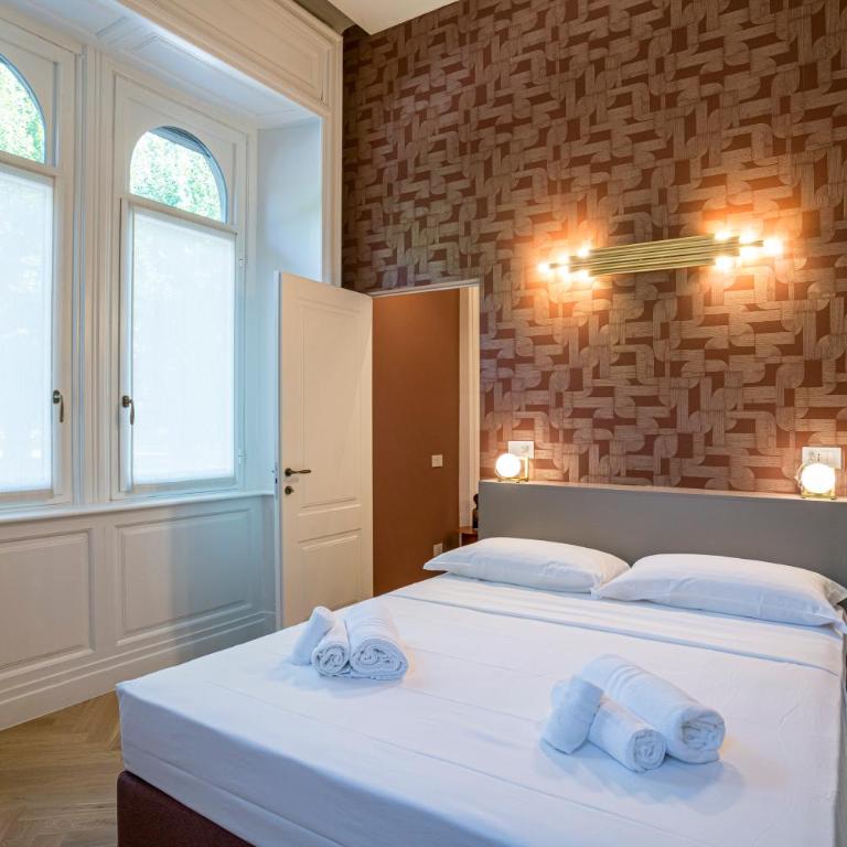 TheLuxe Residences - Deluxe One-Bedroom Apartment - 1