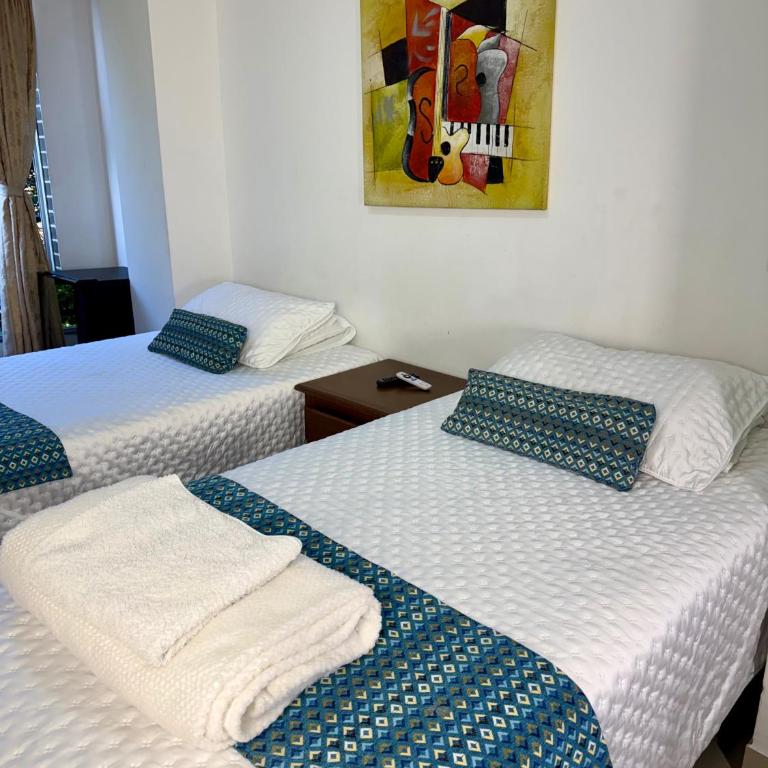 Living Montes - Habitación Triple Estándar - 7