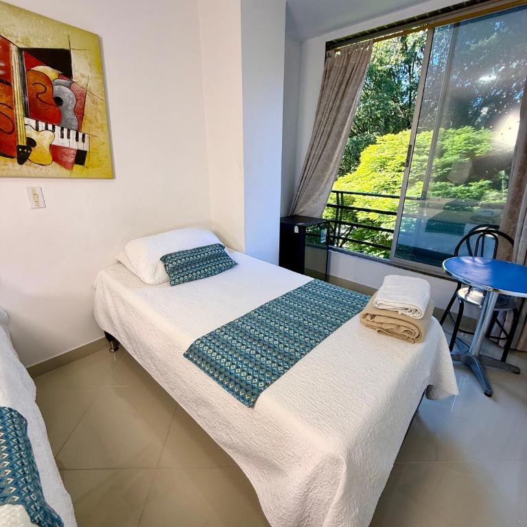 Living Montes - Habitación Triple Estándar - 4
