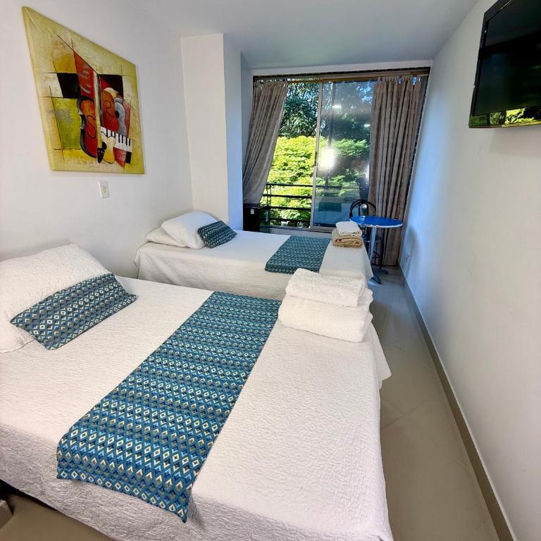 Living Montes - Habitación Triple Estándar - 5