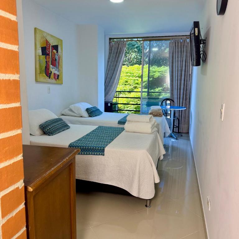 Living Montes - Habitación Triple Estándar - 2