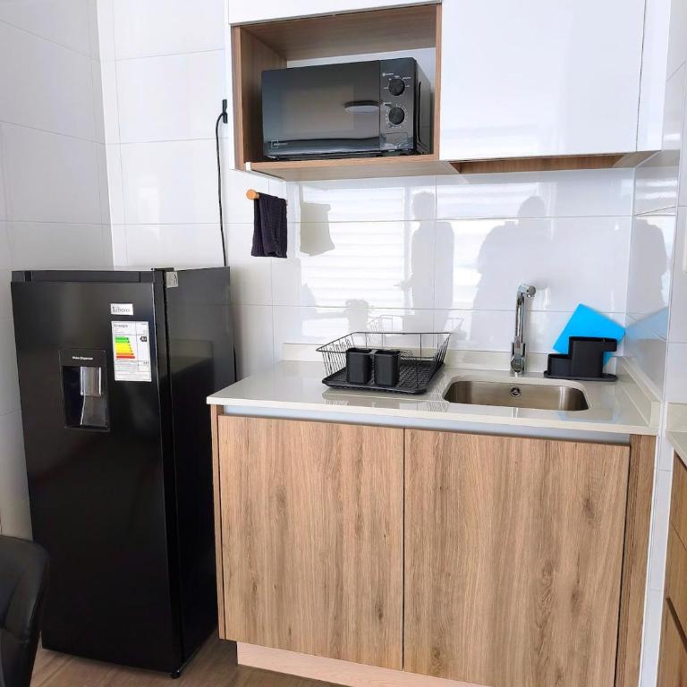 Hermoso departamento a pasos de playa cavancha - Apartamento de 1 dormitorio - 11