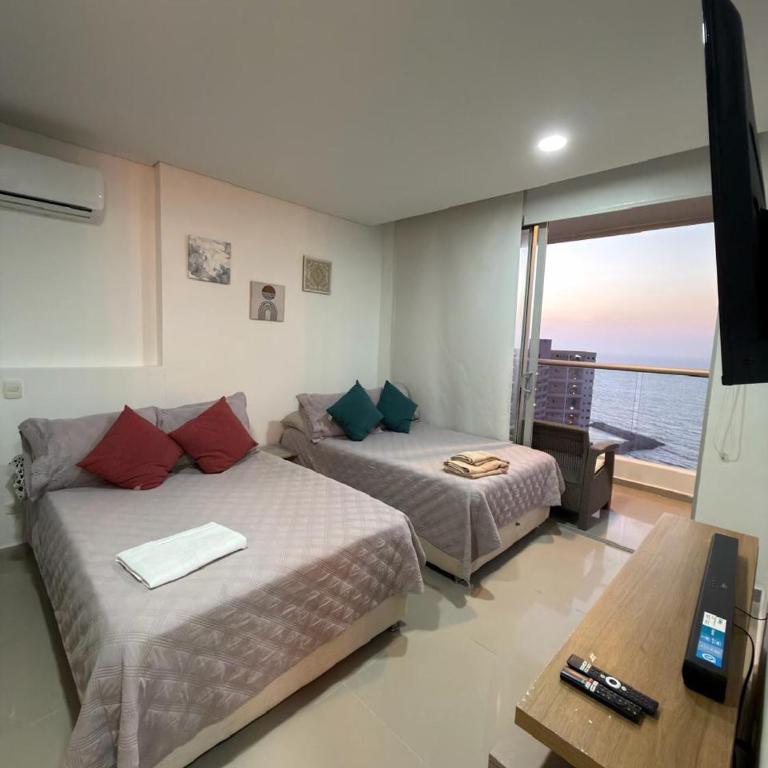 Apartamento Moderno y Lujoso con vista al Mar PISO19 - Cerca a la Ciudad Amurallada - Three-Bedroom Apartment - 7