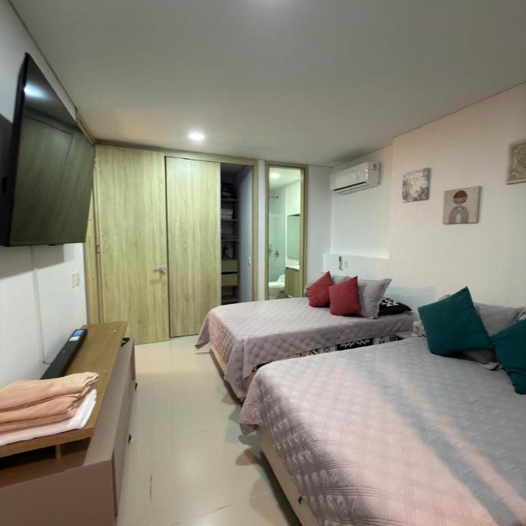 Apartamento Moderno y Lujoso con vista al Mar PISO19 - Cerca a la Ciudad Amurallada - Three-Bedroom Apartment - 14