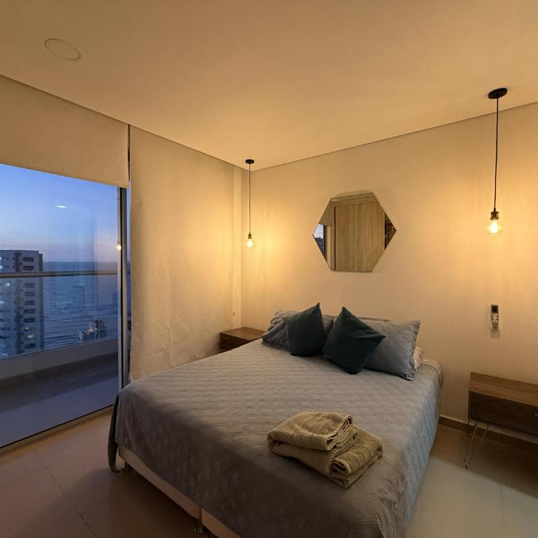 Apartamento Moderno y Lujoso con vista al Mar PISO19 - Cerca a la Ciudad Amurallada - Three-Bedroom Apartment - 34