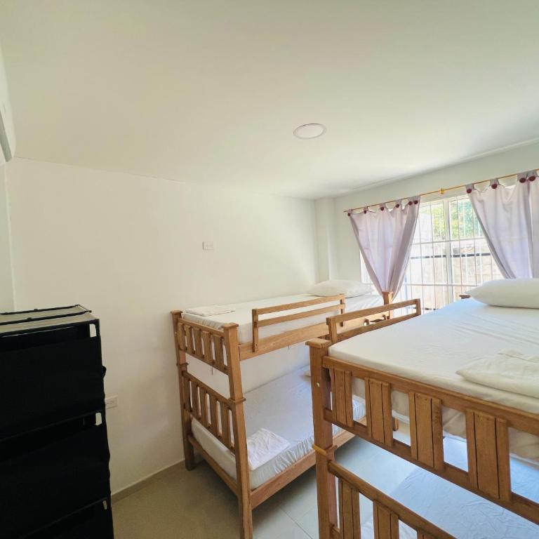Apto con piscina a 7 min caminando de playa Bello Horizonte - Two-Bedroom Apartment - 16