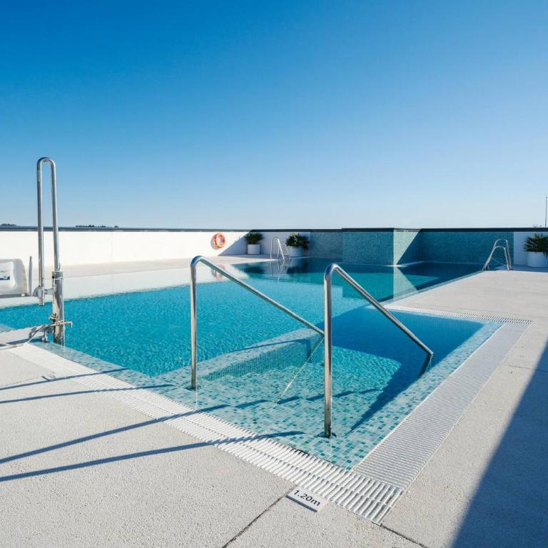 HigueronRentals Urban Sky - Deluxe One-Bedroom Apartment with City View - 21