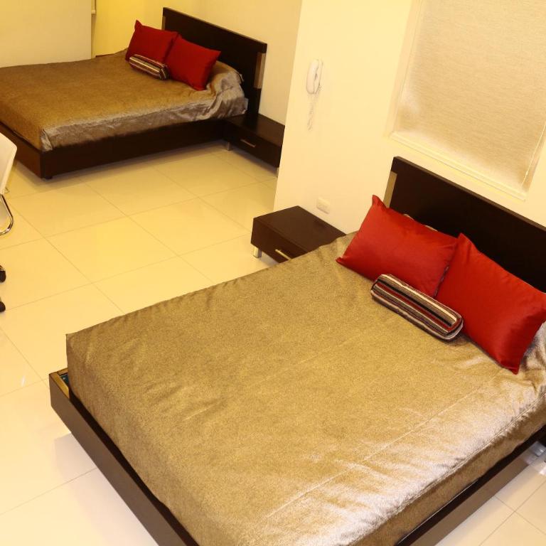 Business Class Prims Hotel - Deluxe Queen Room with Two Queen Beds - 1