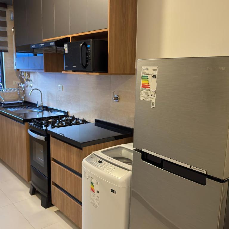 Garzonier moderno con Sofá cama premium, WiFi 150Mb y Lavadora - Apartamento de 1 dormitorio - 11