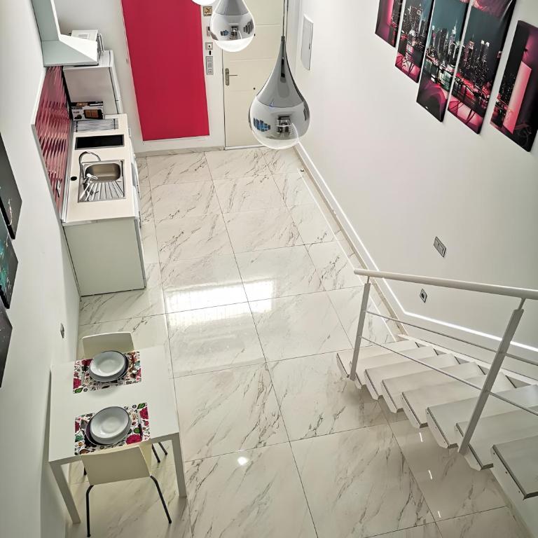Apartamentos Ofis - Estudio Morado - Estudio Superior - 10