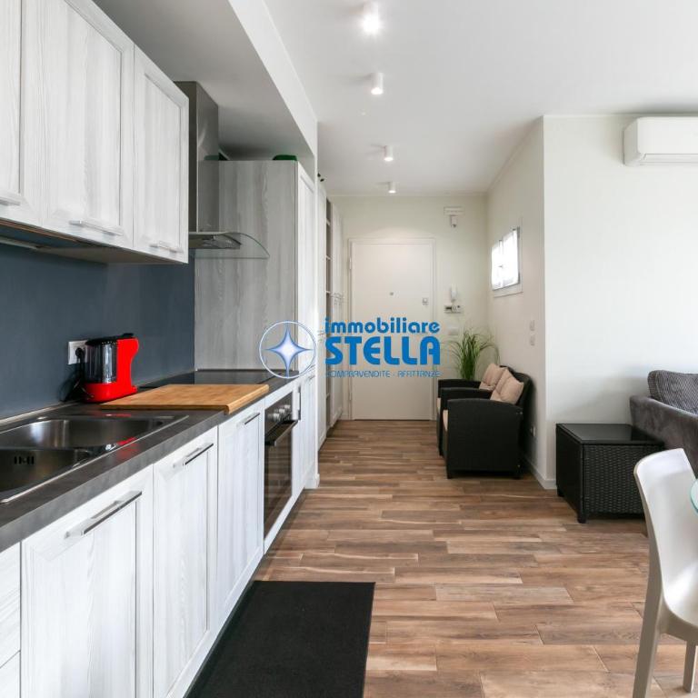 Residence Corer - Appartamento con 2 Camere da Letto e Vista Giardino - 13