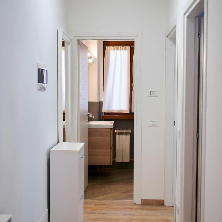 Dolomis Apartments - Appartamento Deluxe con 2 Camere da Letto e Vista Giardino - 11