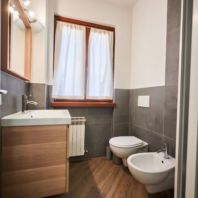 Dolomis Apartments - Appartamento Deluxe con 2 Camere da Letto e Vista Giardino - 13