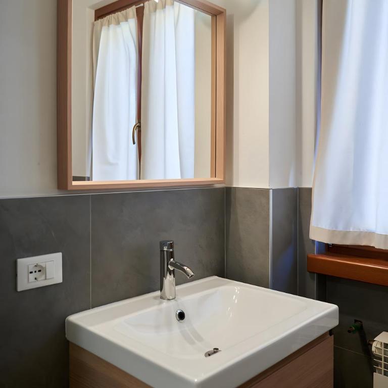 Dolomis Apartments - Appartamento Deluxe con 2 Camere da Letto e Vista Giardino - 12