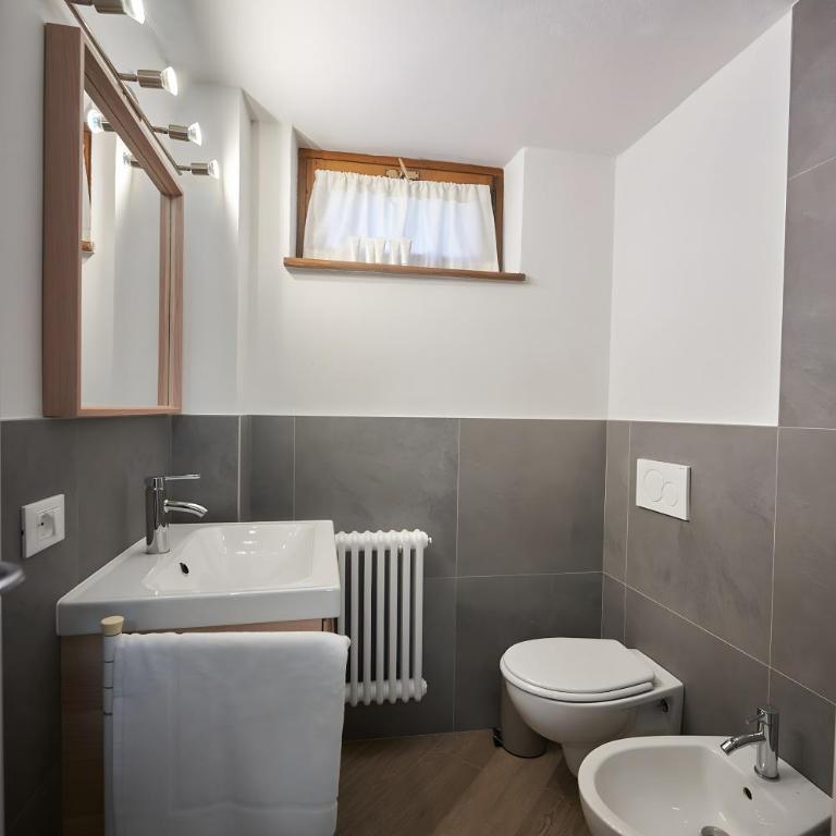 Dolomis Apartments - Appartamento Deluxe con 2 Camere da Letto e Vista Giardino - 10