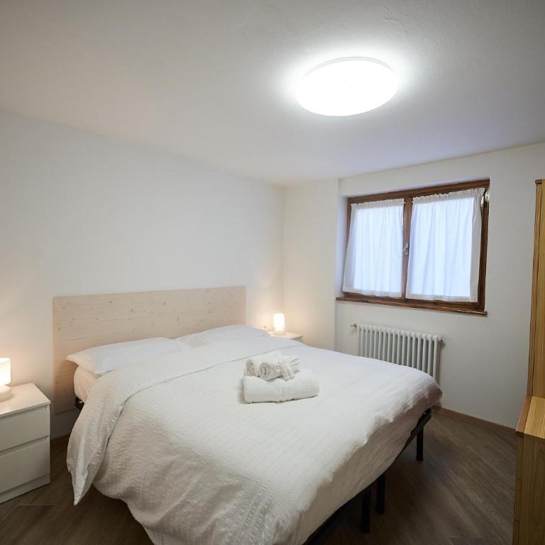 Dolomis Apartments - Appartamento Deluxe con 2 Camere da Letto e Vista Giardino - 6