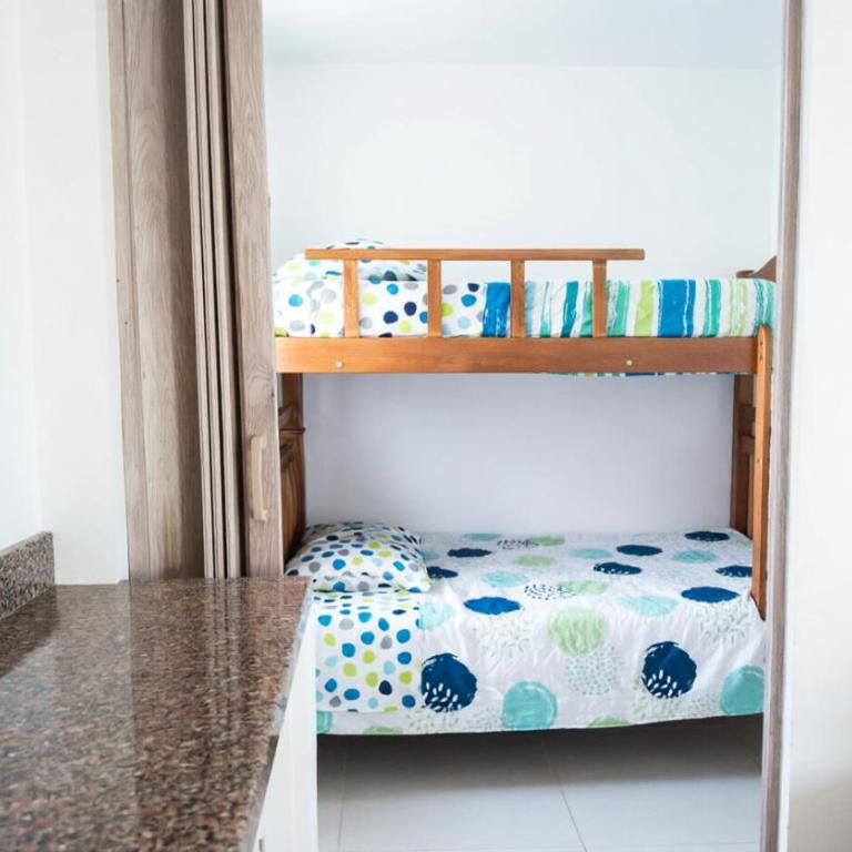 Apartamento con Piscina y Parqueadero cerca a Tayrona - Apartamento de 2 dormitorios con balcón - 13