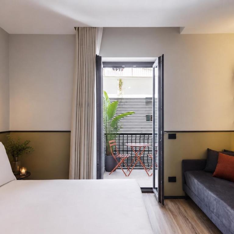 MaHena SUITES PLEBISCITO - Dreibettzimmer mit Balkon - 6