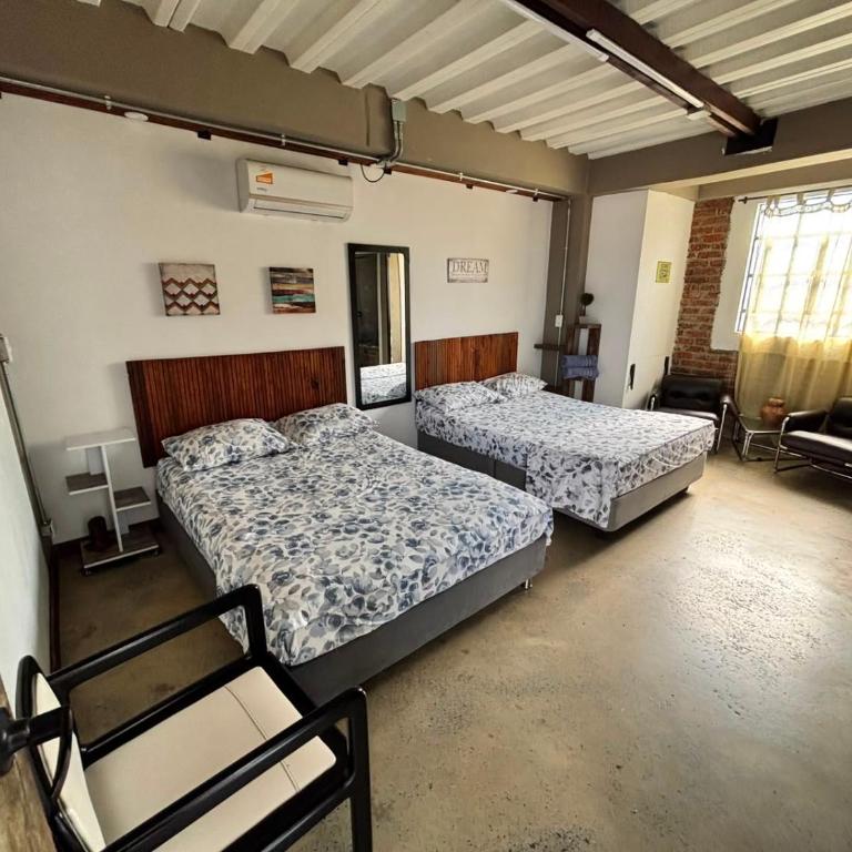 La Curva - Habitación Doble - 2 camas dobles - 1