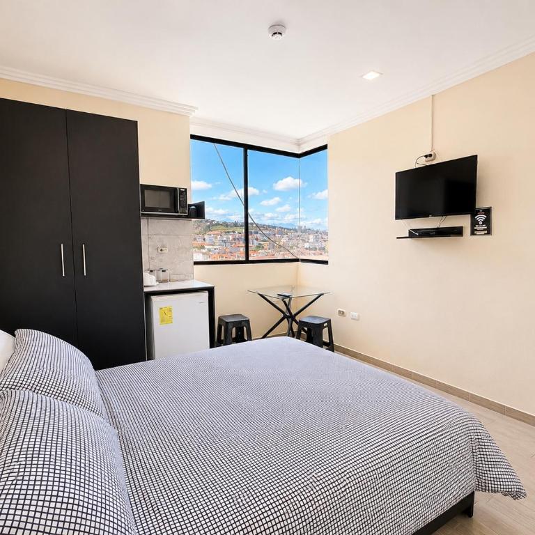 Suitesecu Rentals Cuenca - Habitación Deluxe (2 adultos + 1 niño) - 5