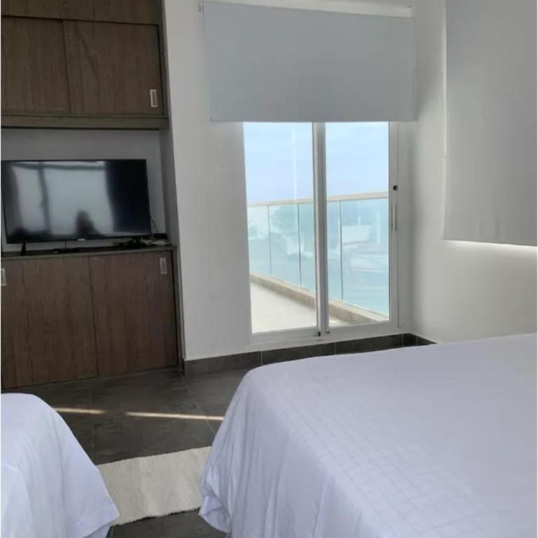 Penthouse luxury cartagena con vista al mar, piscina y capacidad para 12 personas - Four-Bedroom Platinum Apartment - 14