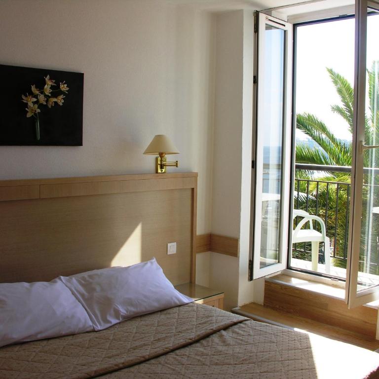 Hôtel La Flore - Chambre Double avec Terrasse - Vue sur Mer - 6
