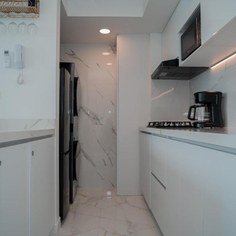 Vista al Mar, Piscina, Piso 26, Playa 5 minutos caminando, Centro y Aeropuerto 10 minutos en carro, VISITAS PERMITIDAS - Apartment - 9