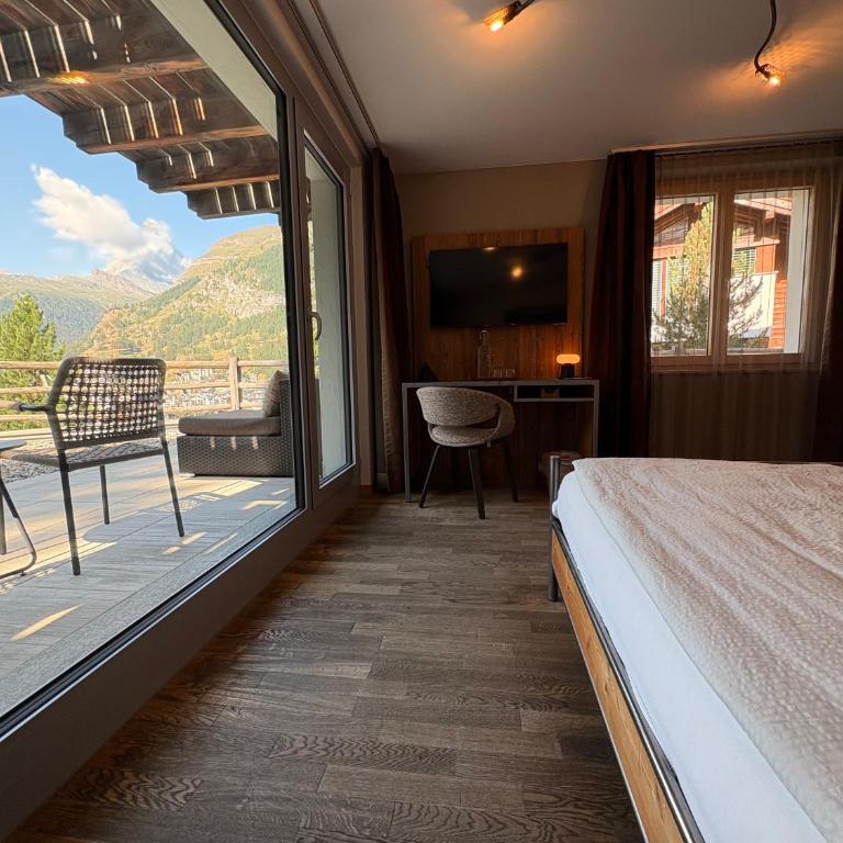 Alpenlodge - Doppelzimmer Style mit Matterhornblick - 13