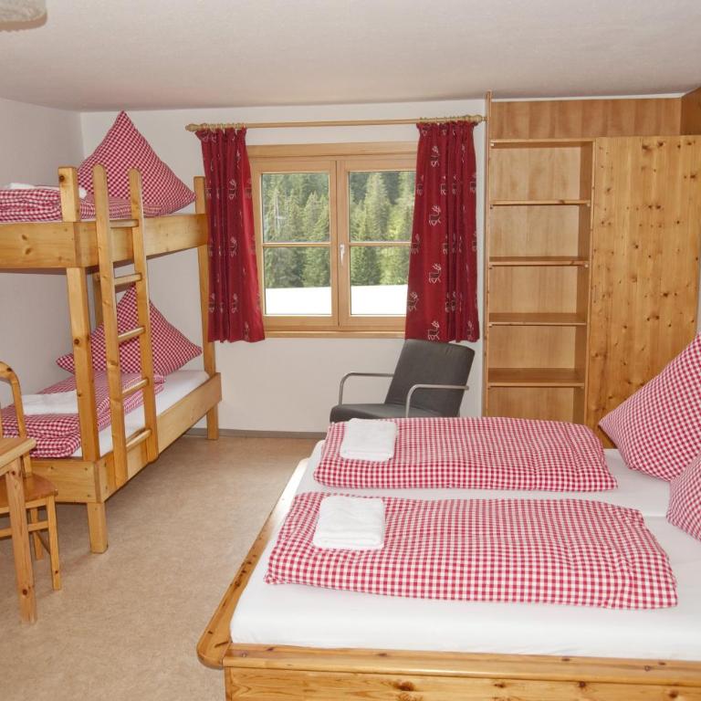 Berghütte Grasgehren - Vierbettzimmer mit Bergblick - 5