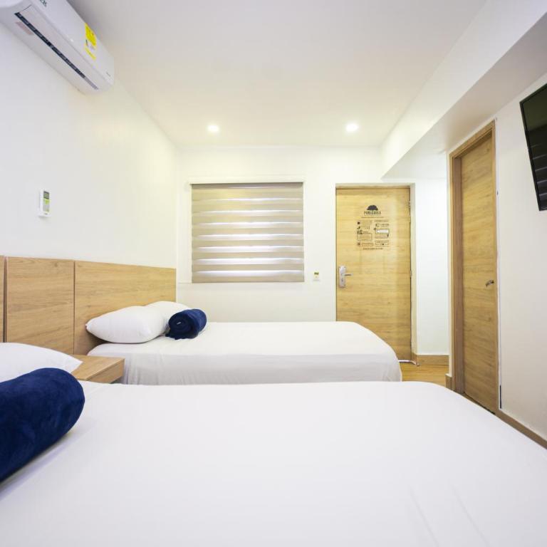 Hotel Poma Rosa Boutique Laureles - Habitación Doble - 2 camas dobles - 3